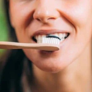 Should I brush my teeth before or after using teeth whitening strips?